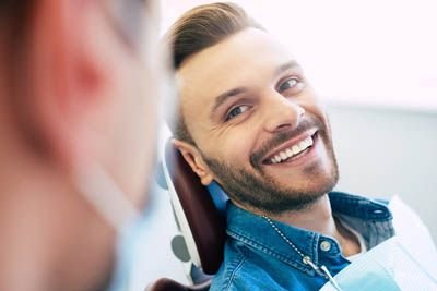 patient smiling during his dental appointment